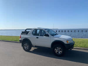 Isuzu Amigo Parkedbythe Lake Wallpaper