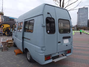 Isuzu Elf Camper Van Rear View Wallpaper