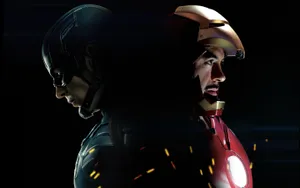 It's A Showdown Between Two Of Marvel's Most Powerful Heroes - Iron Man And Captain America. Wallpaper