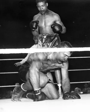 Italian Boxer Primo Carnera Against Joe Louis Wallpaper