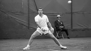 Italian Tennis Player Nicola Pietrangeli On Tennis Court Wallpaper