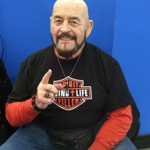 Ivan Koloff, The Iconic Canadian Professional Wrestler In A Medium-angle Shot Wallpaper