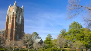 Ivy League Tower_ Sunny Campus Scene Wallpaper