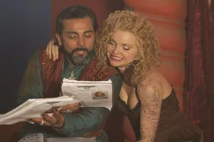 Izabella Miko Posing Effortlessly In Front Of A Beautiful Beach Backdrop. Wallpaper