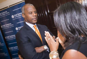 J.c. Watts Arms Crossed Wallpaper