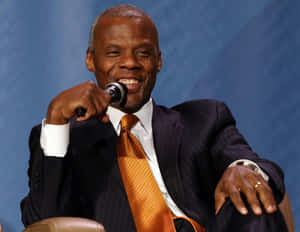 J.c. Watts Speaking In The Microphone Wallpaper