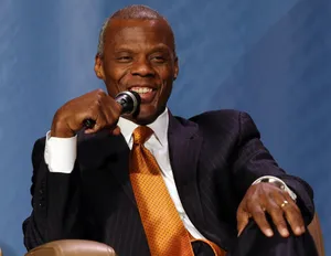 J.c. Watts Speaking In The Microphone Wallpaper