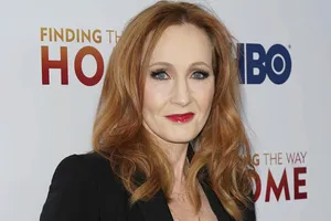 J.k. Rowling Smiling In A Portrait Wallpaper