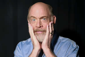 J.k. Simmons Looking Dapper In A Classic Black Tuxedo Wallpaper