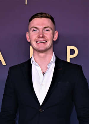 Jack Keating Delivering A Captivating Speech Wallpaper