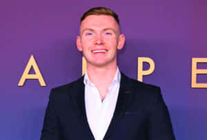 Jack Keating Exploring The Vibrant Cityscape Wallpaper