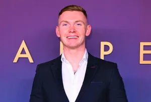 Jack Keating Exploring The Vibrant Cityscape Wallpaper