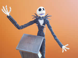 Jack Skellington Figure Orange Background Wallpaper