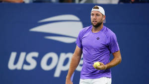 Jack Sock Holding A Tennis Ball Wallpaper