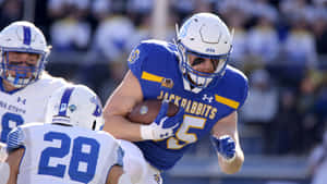 Jackrabbits Football Player In Action Wallpaper