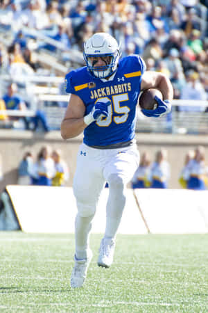 Jackrabbits Football Player Running Action Wallpaper