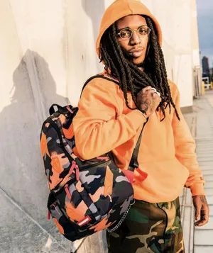 Jacquees Stylish Orange Photoshoot Wallpaper