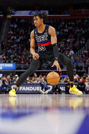 Jaden Ivey Detroit Pistons Game Action Wallpaper