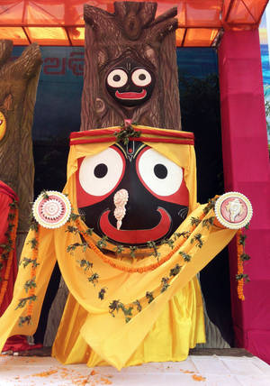 Jagannath Wearing Yellow Dress Wallpaper