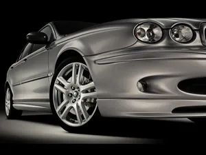 Jaguar X-type: A Luxurious Blend Of Performance & Elegance Wallpaper