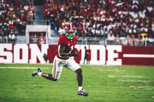 Jahmyr Gibbs Alabama Football Action Shot Wallpaper