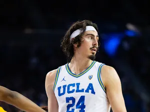 Jaime Jaquez Jr In Action On The Court Wallpaper