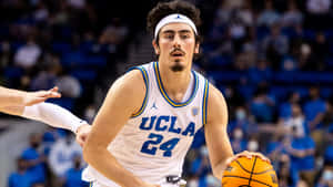 Jaime Jaquez Jr. Shooting A Three-pointer Wallpaper