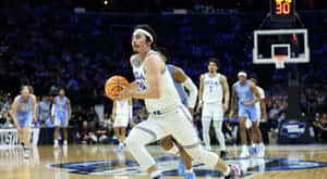 Jaime_ Jaquez_ Jr_ U C L A_ Basketball_ Action.jpg Wallpaper