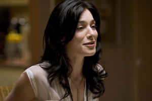 Jaime Murray Posing Elegantly With A Poised Look Wallpaper