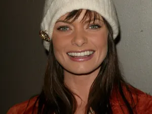 Jaime Pressly Posing Elegantly In A Photoshoot Wallpaper