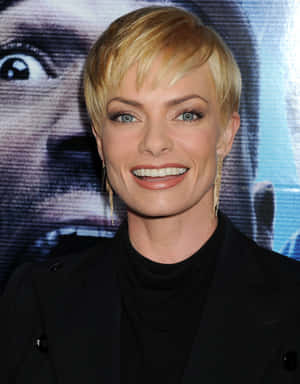 Jaime Pressly Posing In A Fashionable Outfit Wallpaper