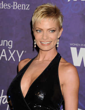 Jaime Pressly Striking A Pose In A Photoshoot Wallpaper