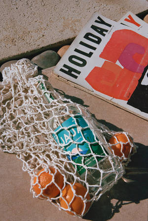 Jaja Tequila Bottle Inside Net Wallpaper