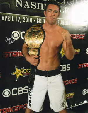 Jake Shields Holding Victory Belt Wallpaper