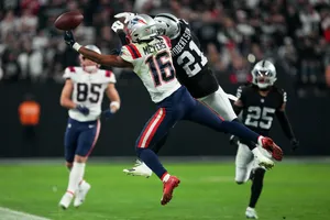 Jakobi Meyers Catching Football In Game Wallpaper