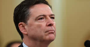 James Comey Serious Expression Wallpaper