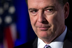 James Comey Serious Expression Wallpaper