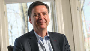 James Comey Smiling Portrait Wallpaper