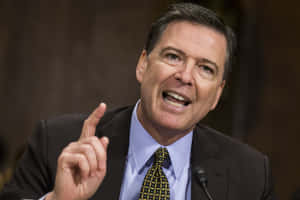 James Comey Speaking Gesture Wallpaper