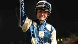 Jamie Kah - Champion Jockey In Action Wallpaper