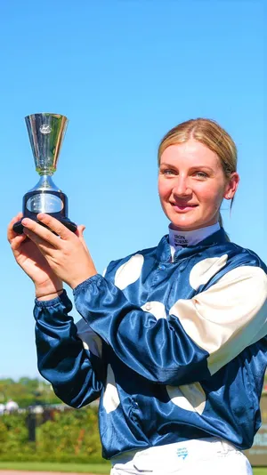 Jamie Kah - Champion Jockey In Action Wallpaper