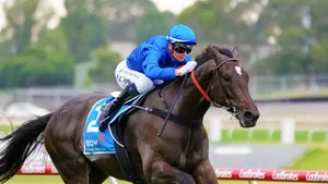 Jamie Kah In Action During A Horse Racing Event Wallpaper