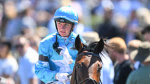 Jamie Kah In Action On The Racing Track Wallpaper