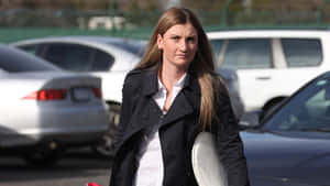 Jamie Kah Posing In Her Jockey Attire Wallpaper