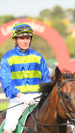 Jamie Kah Smiling After A Successful Race Wallpaper