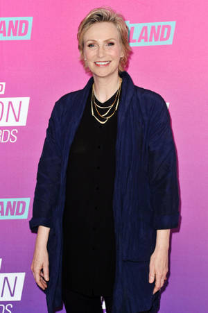 Jane Lynch Pink Background Wallpaper