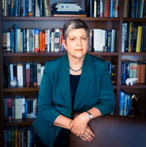 Janet Napolitano Near Book Shelf Wallpaper