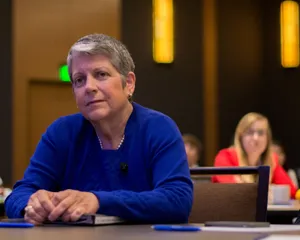 Janet Napolitano Sitting On Chair Wallpaper