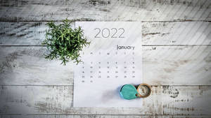 January 2022 Wooden Table Wallpaper