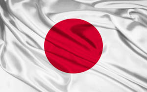 Japan Flag Made Of Silk Fabric Wallpaper